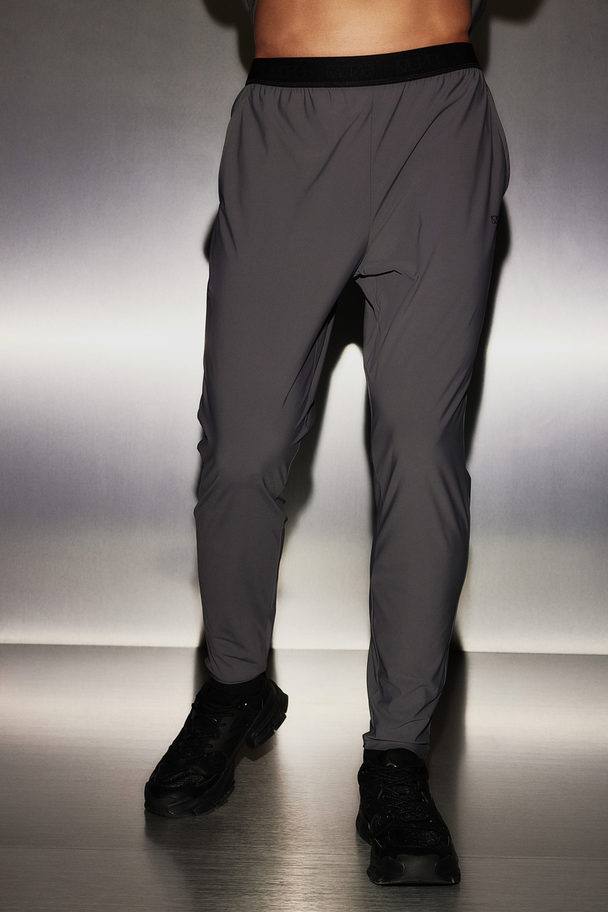 H&M Drymove™ Sports Trousers In 4-way Stretch Dark Grey