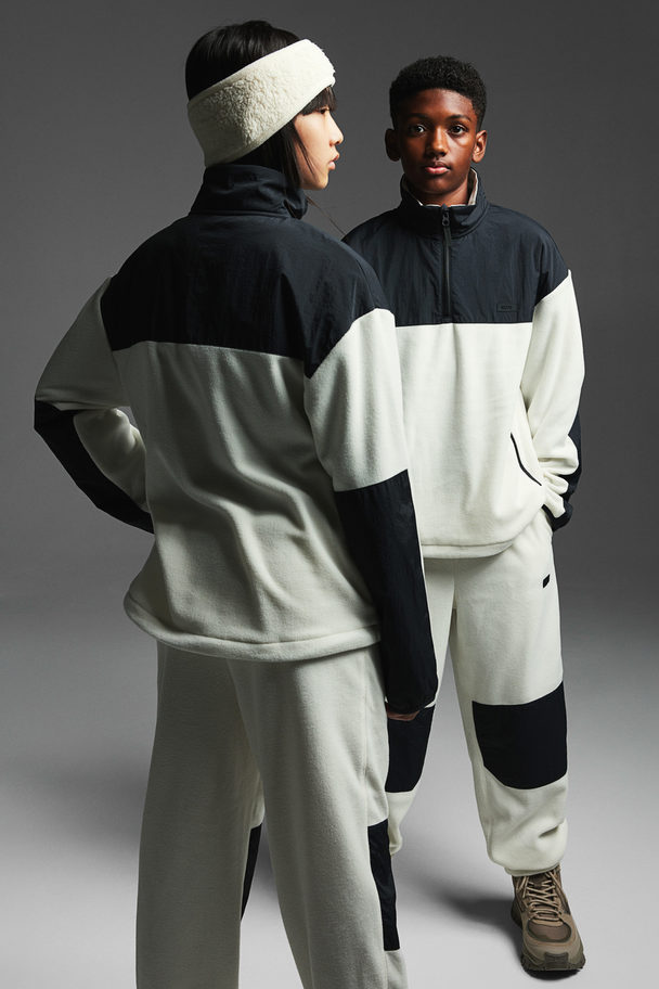 H&M Warme Joggpants aus Fleece Weiß/Blockfarben