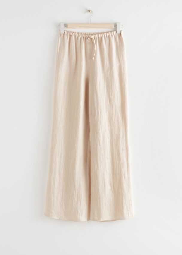 & Other Stories Flared Linen Blend Trousers Beige