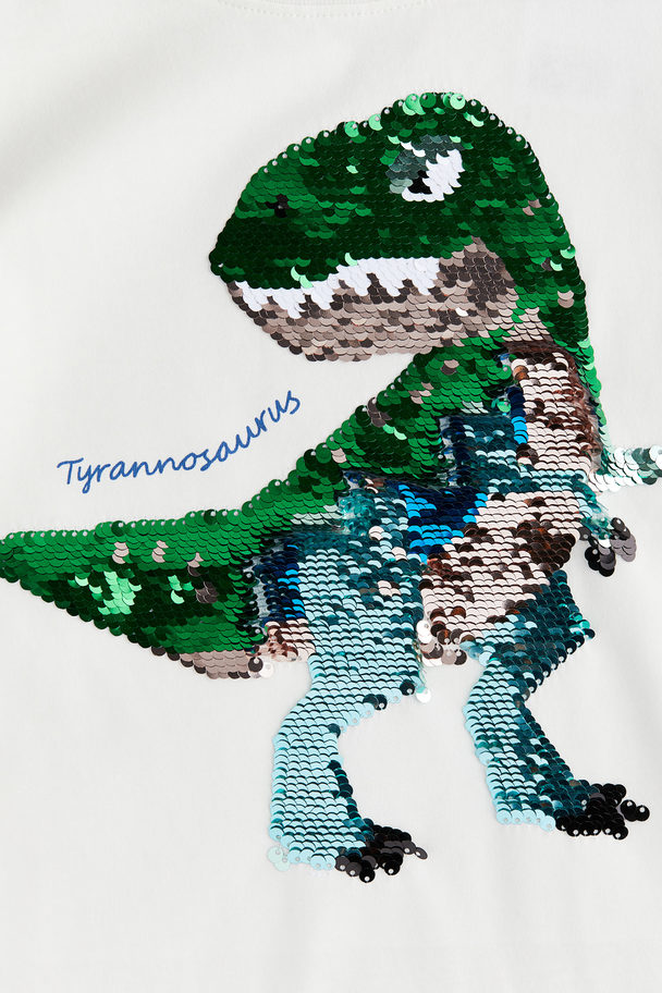 H&M T-Shirt mit Wendepailletten Weiß/Tyrannosaurus