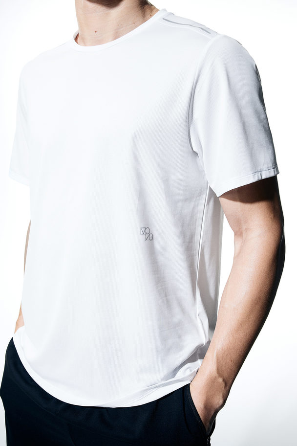 H&M DryMove™ Lauf-T-Shirt Weiß