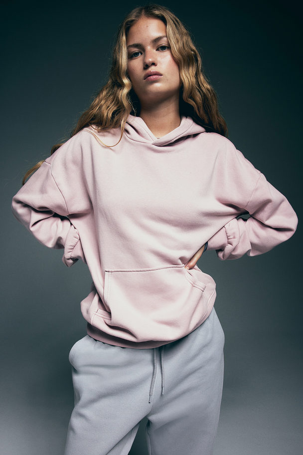 H&M Oversized Capuchonsweater Met Gewassen Look Dusty Roze