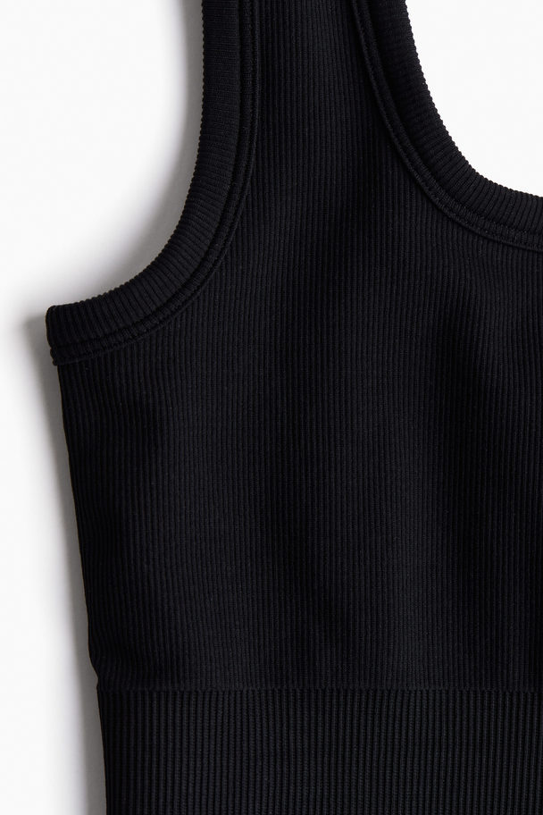 H&M DryMove™ Kurzer Einteiler Seamless Schwarz