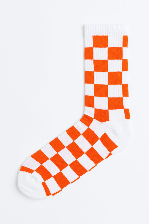 H&M Sokken Oranje/geruit