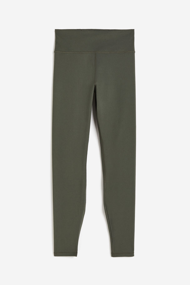 H&M DryMove™ Sportleggings Dunkles Khakigrün