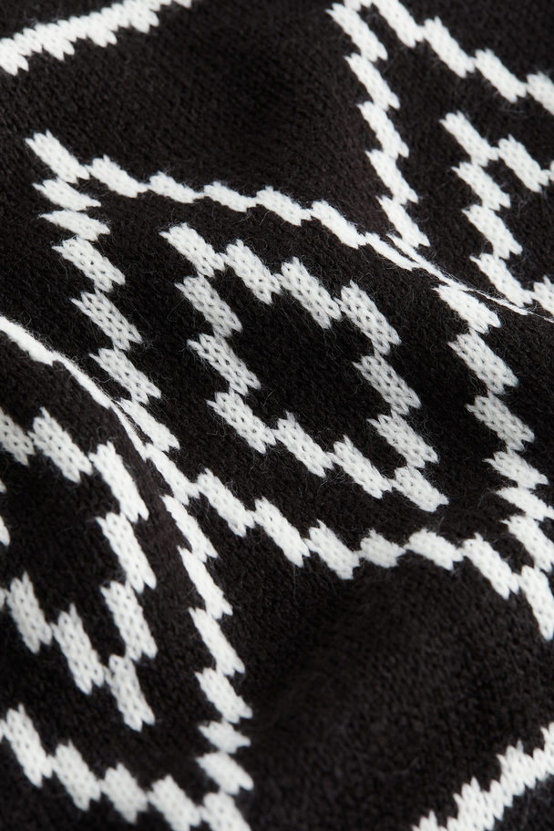 H&M Oversized Pullover mit kurzem Reißverschluss Schwarz/Gemustert