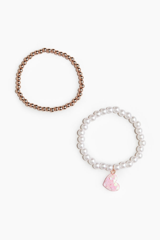 H&M 2er-Pack Armbänder mit Perlen Weiß/Herz