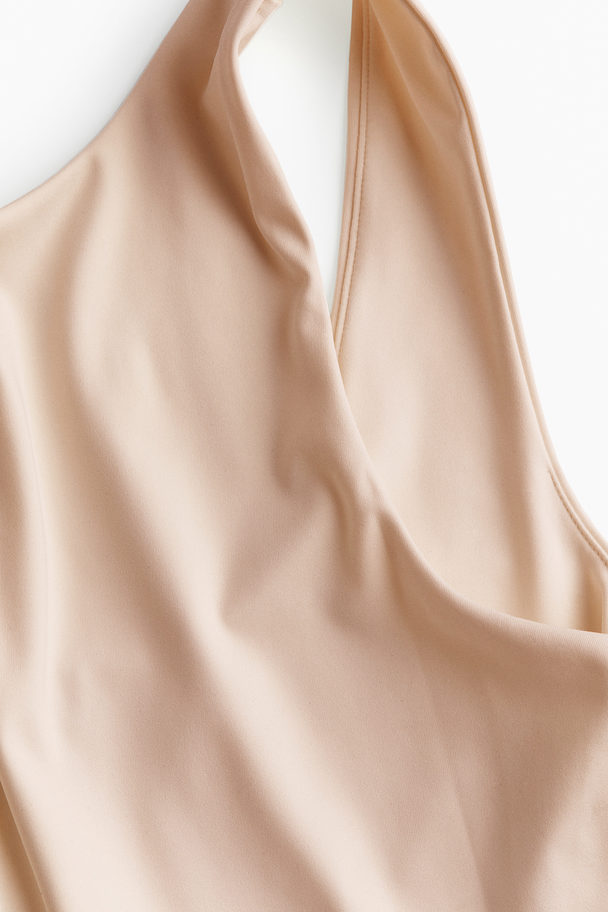 H&M Tangabody mit tiefem Rückenausschnitt Hellbeige