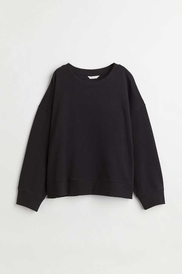 H&M Sweatshirt aus Baumwolle Schwarz