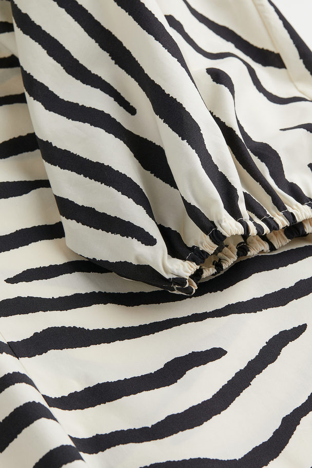 H&M Kleid mit V-Ausschnitt Cremefarben/Zebramuster