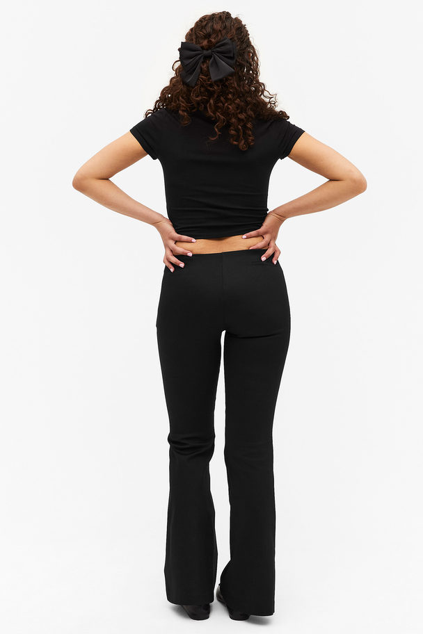 Monki Low Waist Tight Fit Flared Stretchy Trousers Black