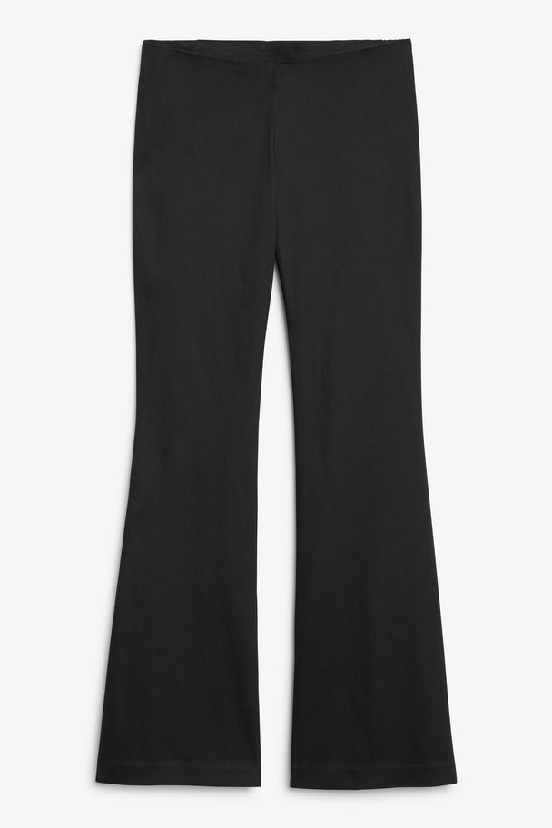 Monki Low Waist Tight Fit Flared Stretchy Trousers Black