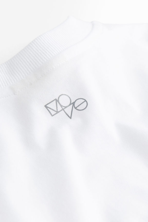 H&M DryMove™ Sportshirt mit Langarm Weiß