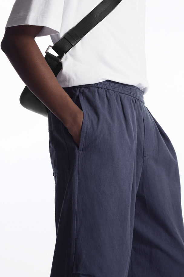 COS Pleated Wide-leg Chambray Trousers Navy