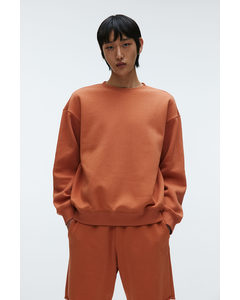 Sweatshirt in Loose Fit Orange