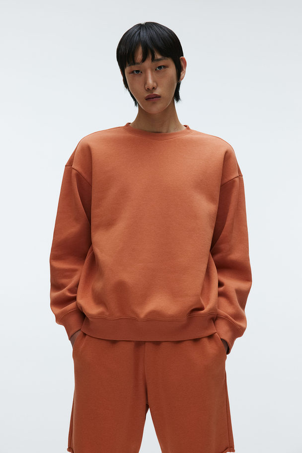 H&M Sweatshirt in Loose Fit Orange