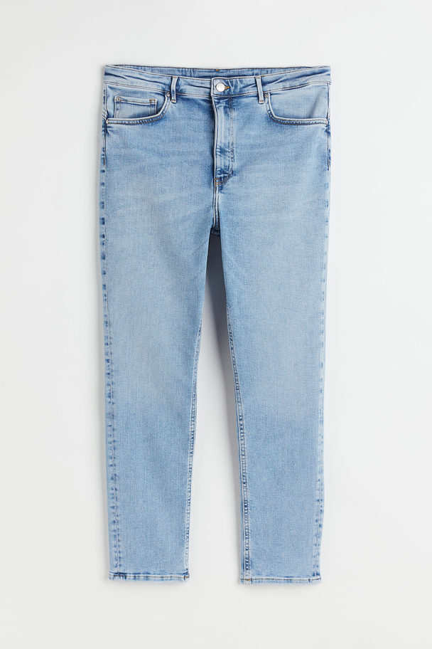H&M H&M+ Shaping High Ankle Jeans Hellblau
