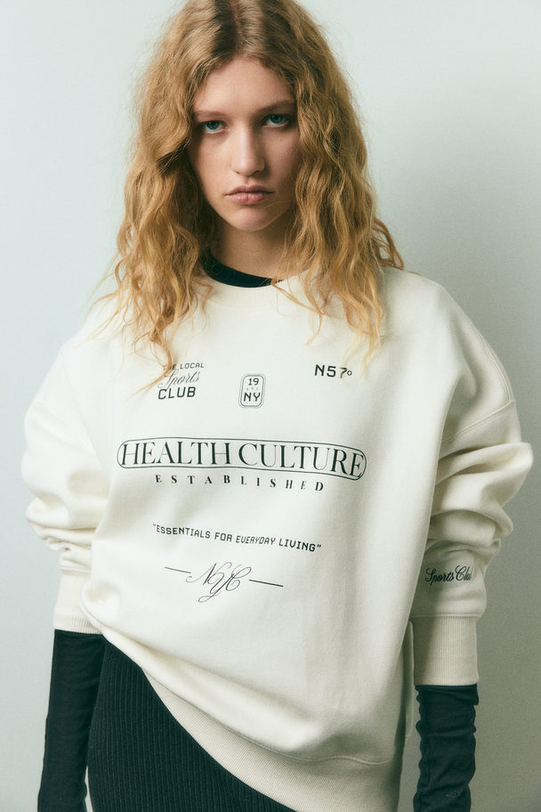 H&M Oversized Sweater Met Motief Roomwit/health Culture