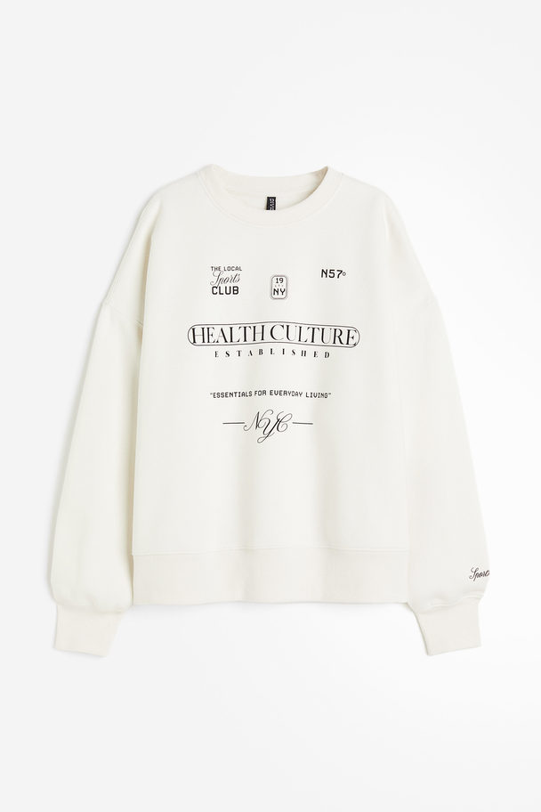 H&M Oversized Sweatshirt mit Motiv Cremefarben/Health Culture
