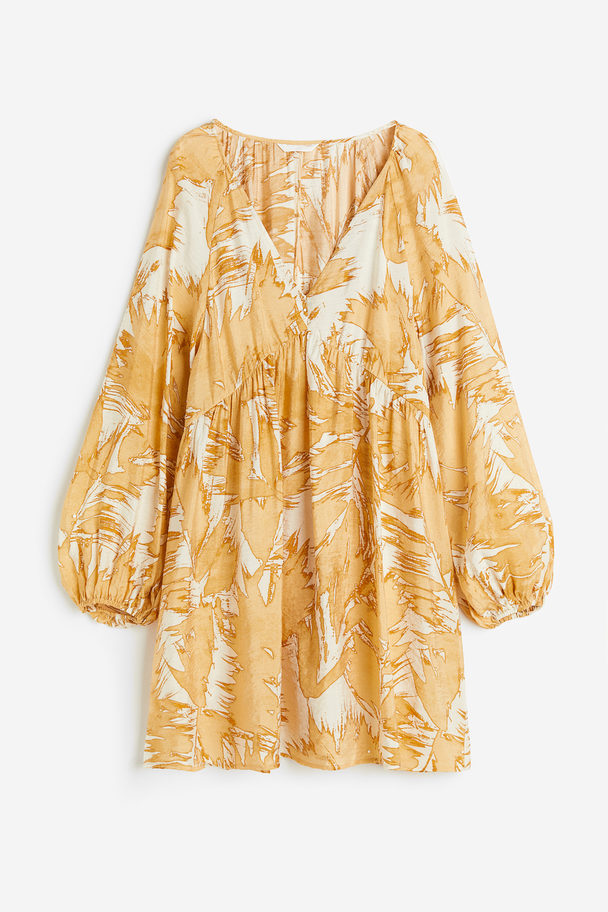 H&M Kleid in A-Linie Cremefarben/Beige gemustert