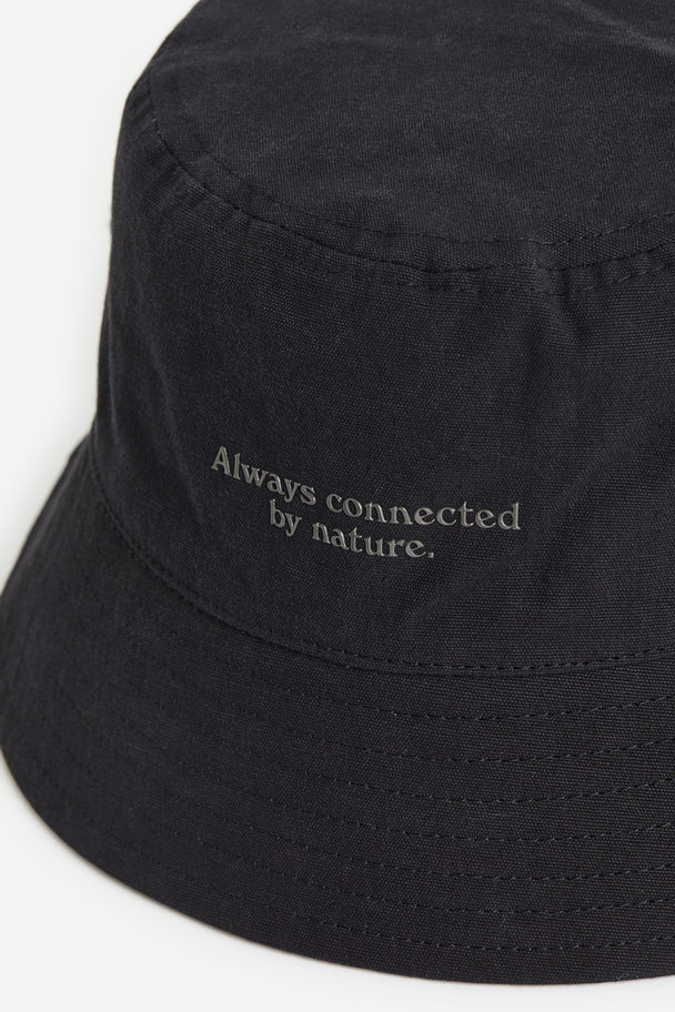 H&M Bucket Hat aus Baumwolle Schwarz/Always Connected