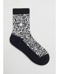 Socken mit Tigermotiv Schwarz/Creme