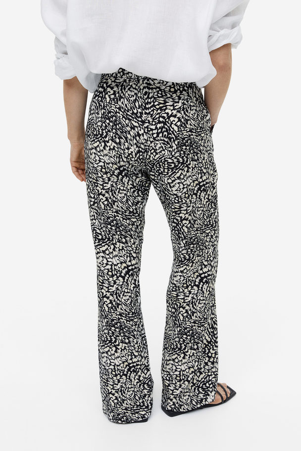 H&M Flared Trousers Black/patterned
