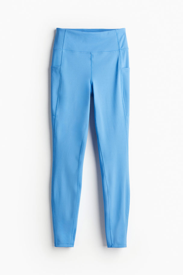 H&M DryMove™ Sportleggings mit Taschendetail Hellblau