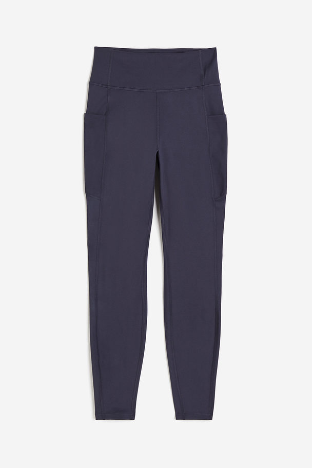 H&M DryMove™ Sportleggings mit Taschendetail Stahlblau