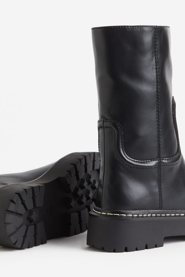 H&M Boots mit Kontrastnähten Schwarz