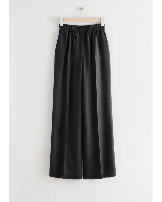 & Other Stories Wide Flared Trousers Black