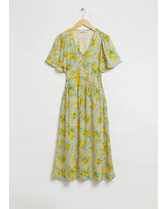 Midi-jurk Met Vlindermouwen Lichtblauw/gele Bloemen