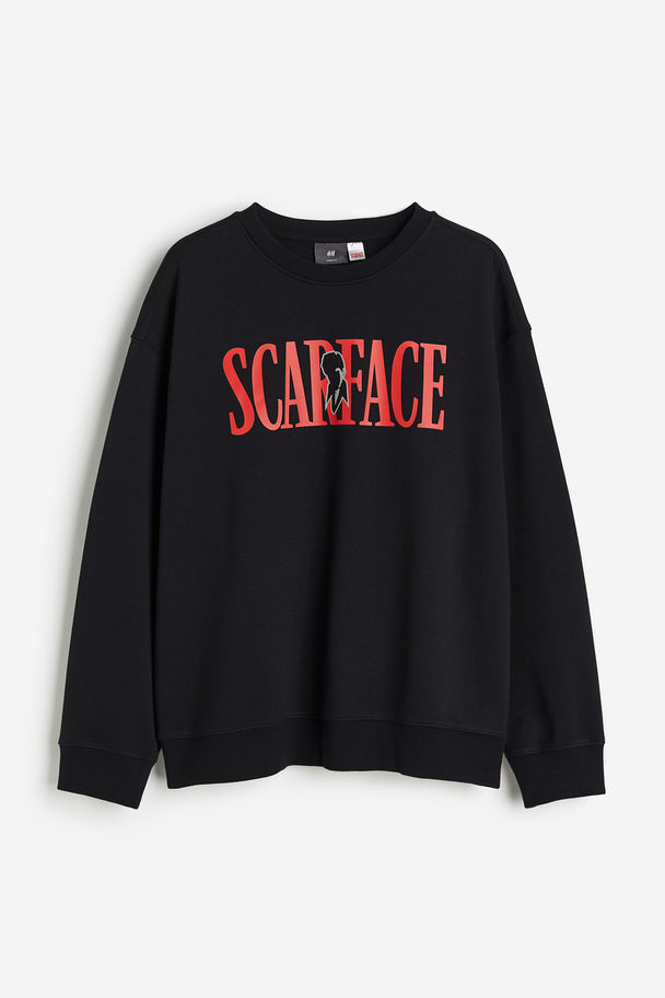 H&M Sweatshirt in Loose Fit Schwarz/Scarface