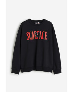 Sweatshirt in Loose Fit Schwarz/Scarface