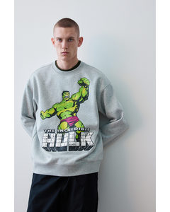 Sweatshirt in Loose Fit Graumeliert/Hulk