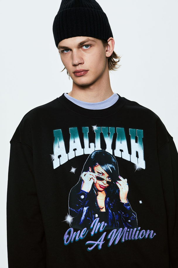 H&M Sweatshirt in Loose Fit Schwarz/Aaliyah