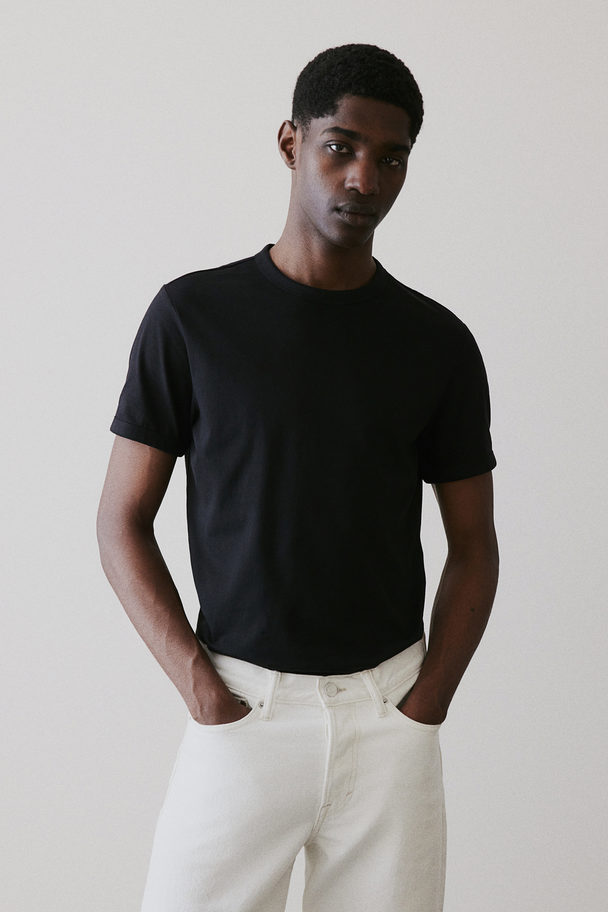 H&M Baumwoll-T-Shirt in Slim Fit Schwarz