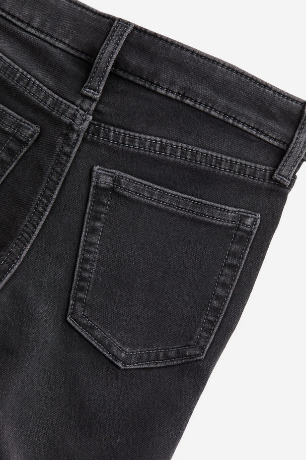 H&M Super Soft Skinny Fit Jeans Ausgewaschenes Schwarz