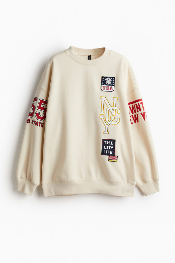 H&M Oversized Sweatshirt mit Print Hellbeige/NYC