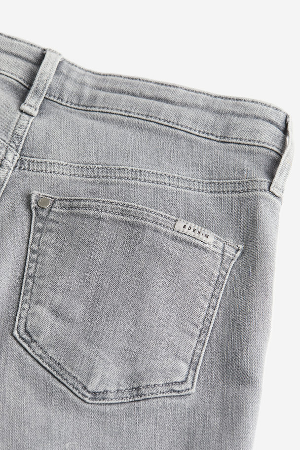 H&M Shaping Skinny High Jeans Hellgrau