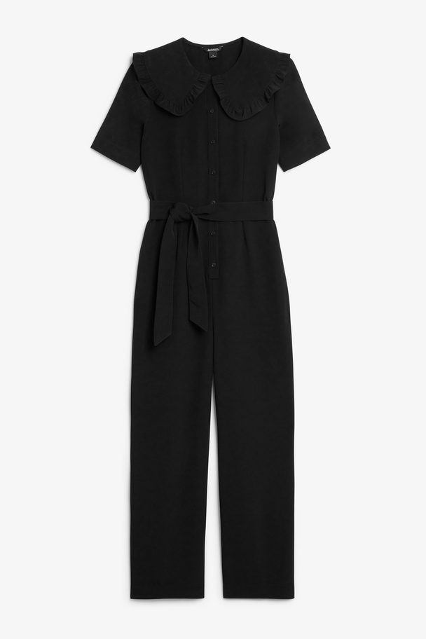Monki Black Buttoned Jumpsuit With Ruffle Shirt Collar Black Dark