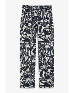 Denim Style Trousers With All-over Print Dark Blue And Beige Print