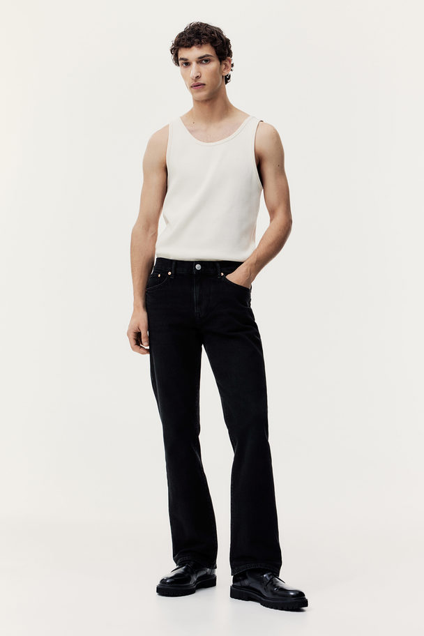 H&M Flared Slim Jeans Schwarz