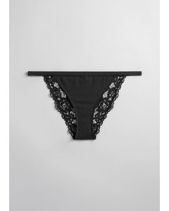 Mini-Slip mit Spitze mit Wellenkante Schwarz