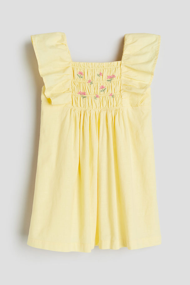 H&M Baumwollkleid mit Smokdetail Gelb