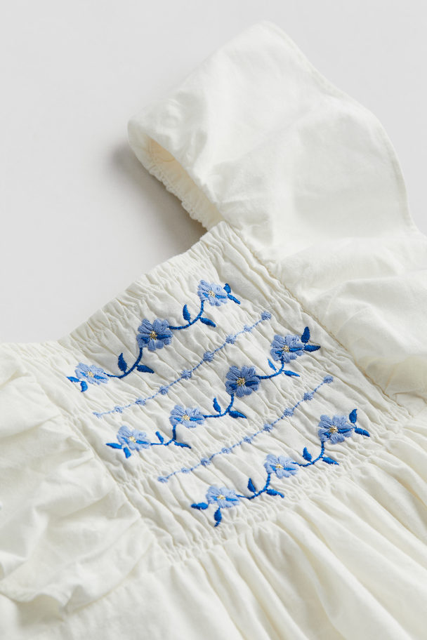 H&M Baumwollkleid mit Smokdetail Weiß/Blumen