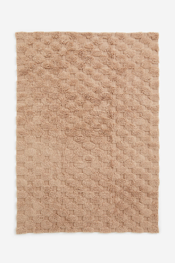 H&M HOME Getufteter Teppich aus Wollmix Beige