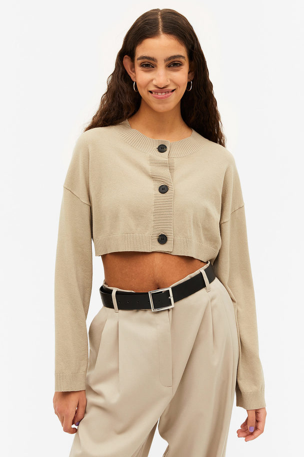 Monki cropped cable knit cardigan in beige