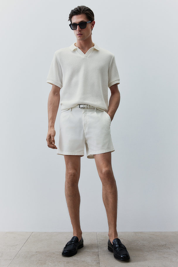 H&M Poloshirt aus feinem Rippstrick in Regular Fit Weiß