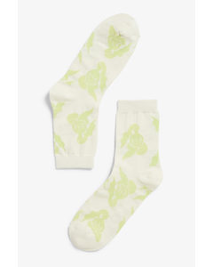 Socken mit hellgrünem Print Hellgrüner Körper-Print